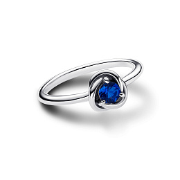 Sterling silver ring with princess blue crystal