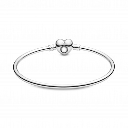 Silver bangle with heart­shaped clasp